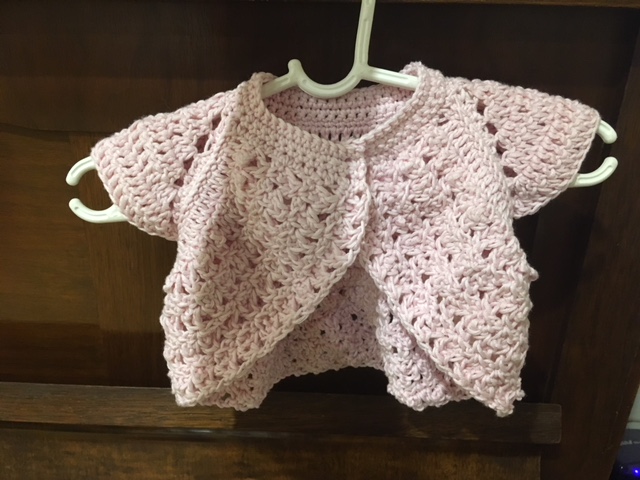 pink crochet shrug