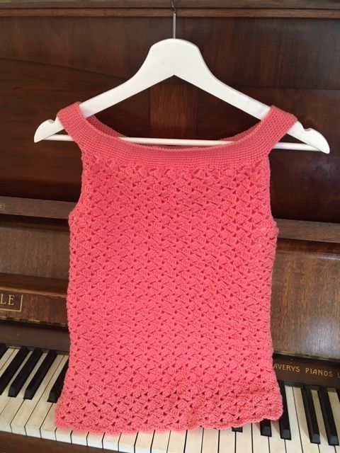 the crocheted, coral "off the shoulder" top